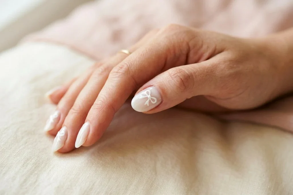 Tiny White Bows nail